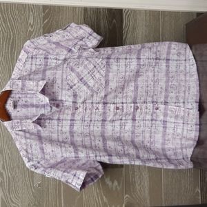 Adrissa Delafield purple shirt